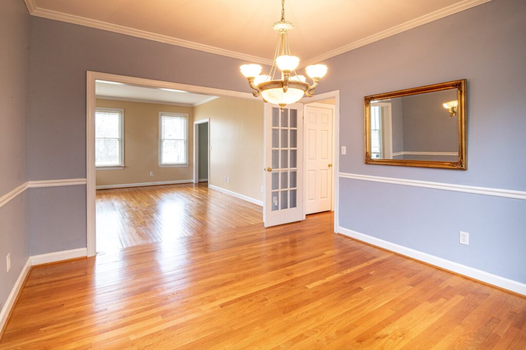 Hardwood Floors in Open Connected Room